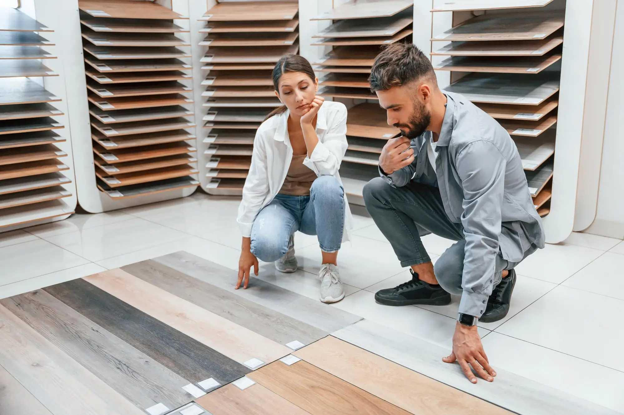 couple choosing tiles